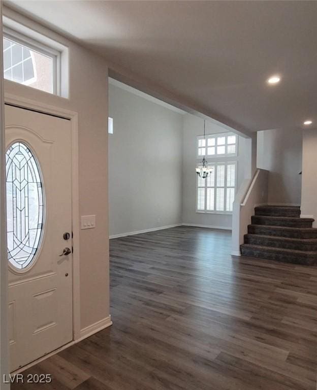 5509 Big Sky Ln, Las Vegas, NV 89149 - entryway featuring a chandelier, stairway, dark wood-style flooring, recessed lighting, and baseboards