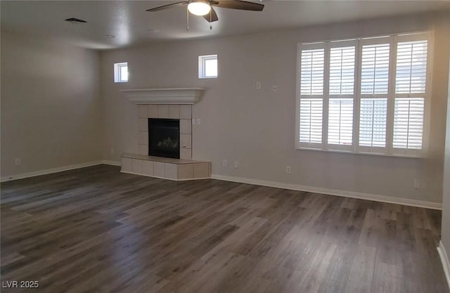 5509 Big Sky Ln, Las Vegas, NV 89149 - unfurnished living room featuring a ceiling fan, dark wood-style floors, and baseboards