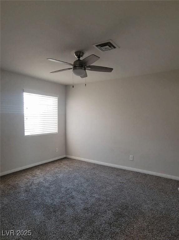 5509 Big Sky Ln, Las Vegas, NV 89149 - spare room featuring ceiling fan, carpet floors, and baseboards