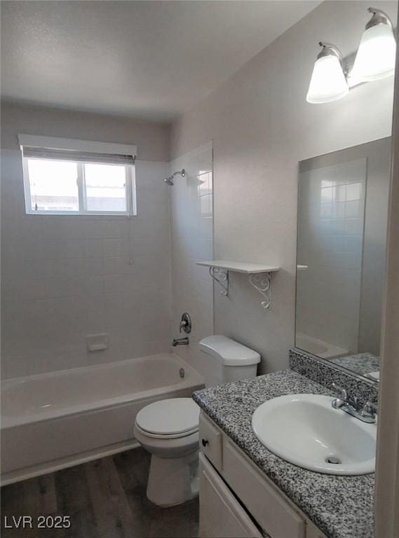 5509 Big Sky Ln, Las Vegas, NV 89149 - bathroom with tub / shower combination, vanity, toilet, and wood finished floors