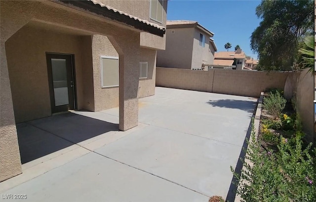 5509 Big Sky Ln, Las Vegas, NV 89149 - fenced backyard with a patio