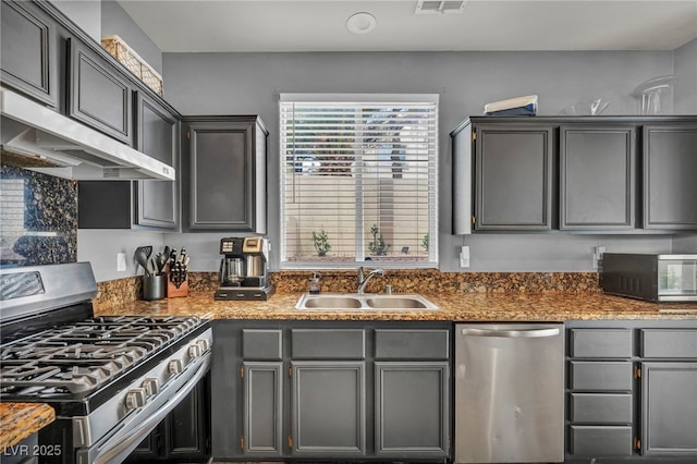 10952 Napa Ridge Dr, Las Vegas, NV 89144 - kitchen with appliances with stainless steel finishes, range hood, and gray cabinets