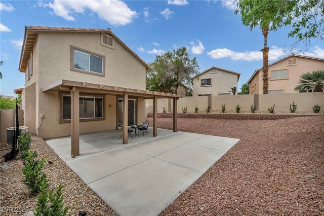 10952 Napa Ridge Dr, Las Vegas, NV 89144 - rear view of property with stucco siding, a fenced backyard, and a patio area
