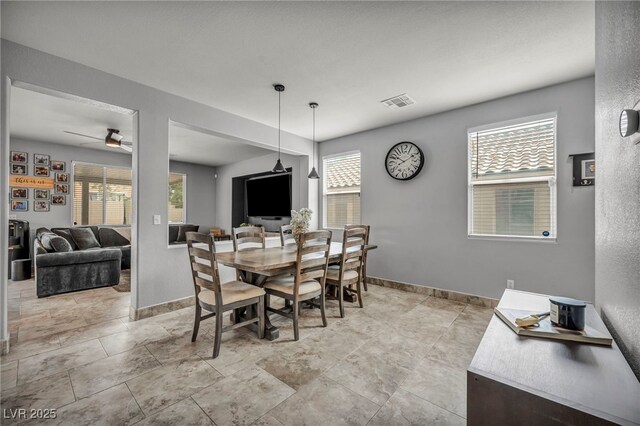 10952 Napa Ridge Dr, Las Vegas, NV 89144 - dining room with healthy amount of natural light and ceiling fan