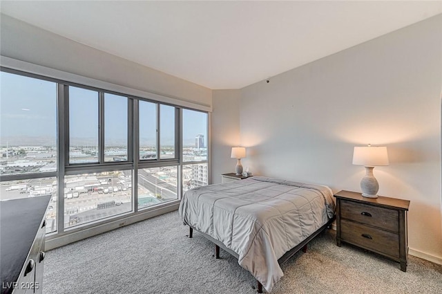 4525 Dean Martin Dr Unit 1208, Las Vegas, NV 89103 - bedroom featuring light colored carpet and baseboards