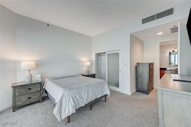4525 Dean Martin Dr Unit 1208, Las Vegas, NV 89103 - bedroom featuring lofted ceiling, a closet, and light carpet