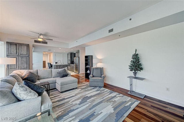 4525 Dean Martin Dr Unit 1208, Las Vegas, NV 89103 - living room featuring wood finished floors and ceiling fan