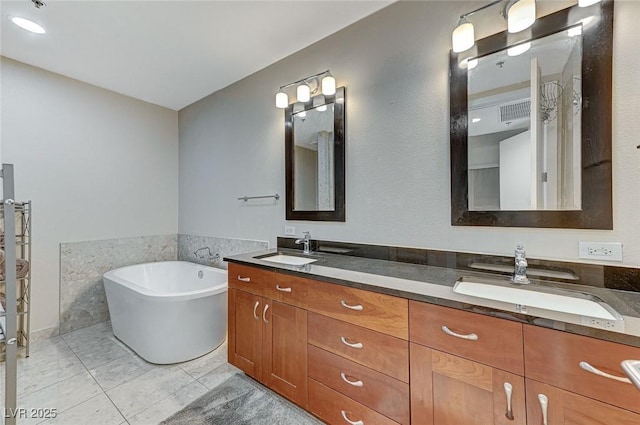 4525 Dean Martin Dr Unit 1208, Las Vegas, NV 89103 - full bath with a soaking tub, double vanity, and tile patterned flooring