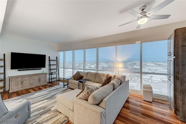 4525 Dean Martin Dr Unit 1208, Las Vegas, NV 89103 - living area featuring wood finished floors and ceiling fan
