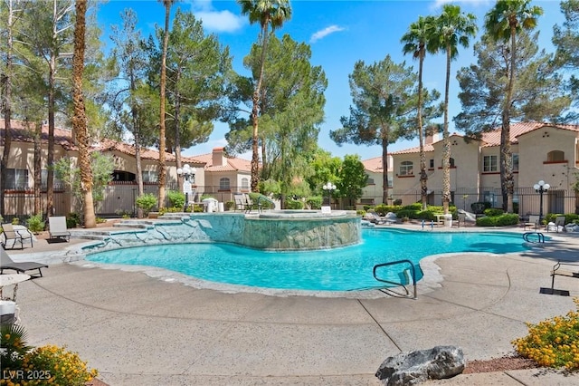 8409 Running Deer Ave Unit 203, Las Vegas, NV 89145 - community pool featuring a patio area and a residential view