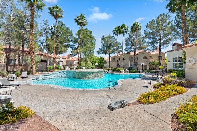 8409 Running Deer Ave Unit 203, Las Vegas, NV 89145 - community pool featuring a residential view and a patio