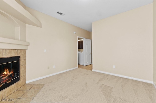 8409 Running Deer Ave Unit 203, Las Vegas, NV 89145 - unfurnished living room with a fireplace and carpet floors