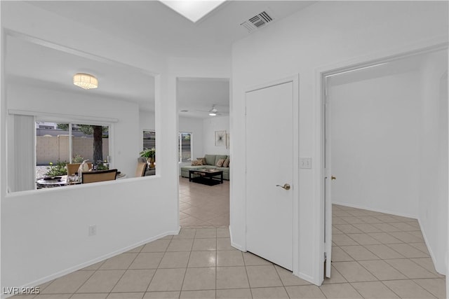 2323 Barbers Point Pl, Las Vegas, NV 89134 - corridor with light tile patterned floors and baseboards