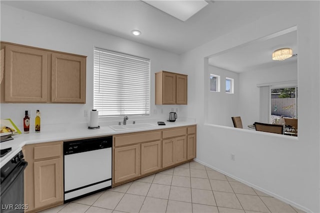2323 Barbers Point Pl, Las Vegas, NV 89134 - kitchen featuring dishwasher, stove, a sink, light countertops, and light brown cabinets
