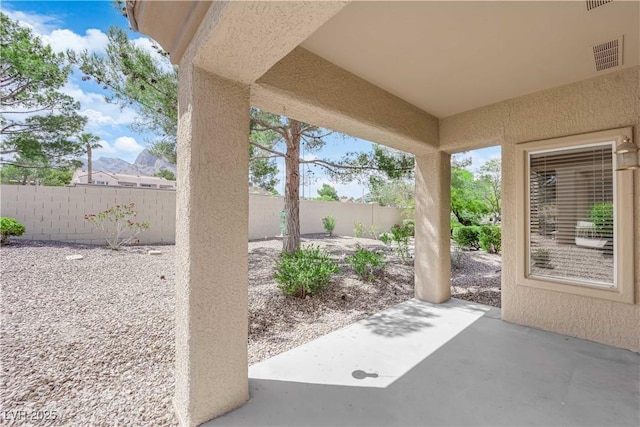 2323 Barbers Point Pl, Las Vegas, NV 89134 - fenced backyard with a patio area