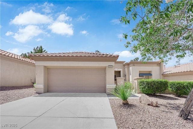 2323 Barbers Point Pl, Las Vegas, NV 89134 - mediterranean / spanish home with stucco siding, a garage, and driveway