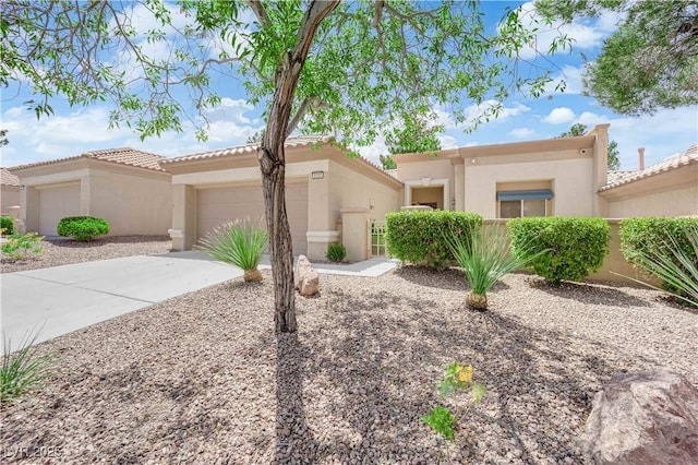 2323 Barbers Point Pl, Las Vegas, NV 89134 - view of front of home featuring stucco siding, driveway, and an attached garage