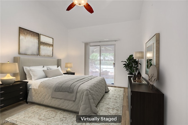 1305 Chaparral Summit Dr, Las Vegas, NV 89117 - bedroom featuring access to outside, light wood-type flooring, a ceiling fan, and vaulted ceiling
