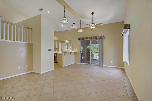 1305 Chaparral Summit Dr, Las Vegas, NV 89117 - unfurnished room featuring a ceiling fan, lofted ceiling, light tile patterned flooring, and baseboards