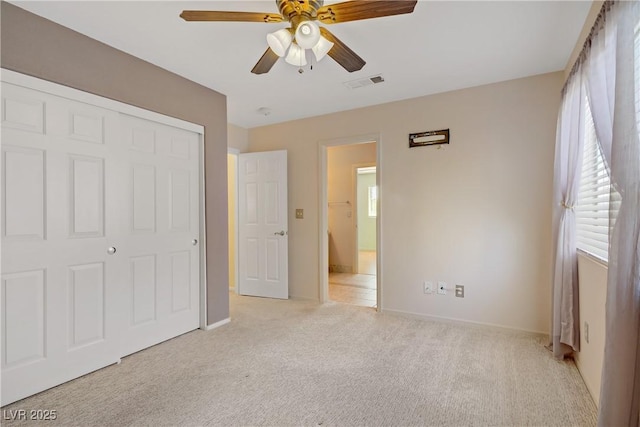 1305 Chaparral Summit Dr, Las Vegas, NV 89117 - unfurnished bedroom featuring light colored carpet and multiple windows