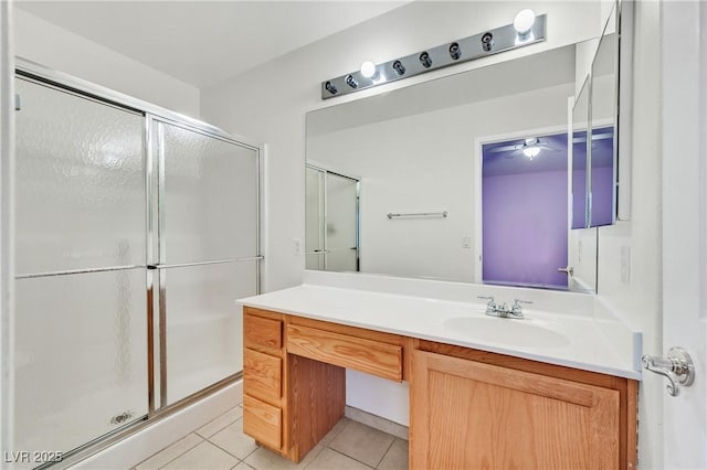 5429 Sweet Shade St, Las Vegas, NV 89130 - bathroom featuring a stall shower, vanity, tile patterned flooring, and a ceiling fan