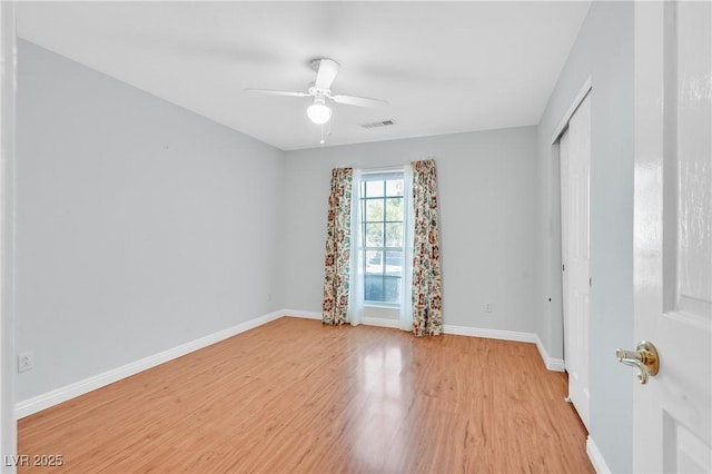 5429 Sweet Shade St, Las Vegas, NV 89130 - spare room featuring light wood-style flooring, a ceiling fan, and baseboards