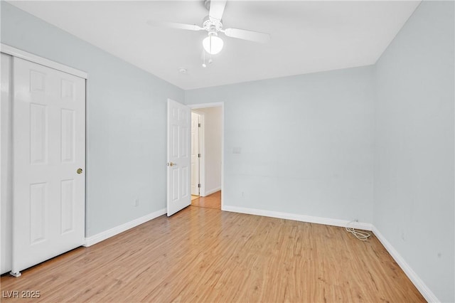 5429 Sweet Shade St, Las Vegas, NV 89130 - unfurnished bedroom with light wood-style floors, baseboards, and a closet