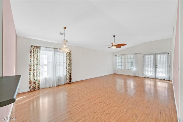 5429 Sweet Shade St, Las Vegas, NV 89130 - unfurnished living room with light wood-style flooring, ceiling fan, lofted ceiling, a chandelier, and baseboards