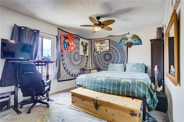 5706 W Lake Mead Blvd, Las Vegas, NV 89108 - bedroom featuring carpet, a textured ceiling, a desk, and a ceiling fan