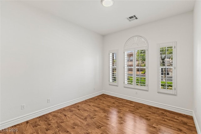 2846 Barrow Downs St, Las Vegas, NV 89135 - unfurnished room with baseboards and wood finished floors