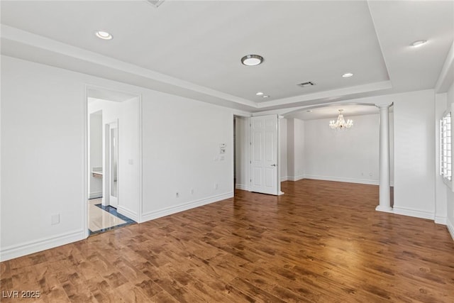 2846 Barrow Downs St, Las Vegas, NV 89135 - spare room featuring a raised ceiling, a chandelier, wood finished floors, recessed lighting, and baseboards