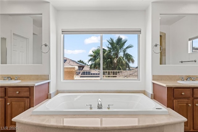 2846 Barrow Downs St, Las Vegas, NV 89135 - bathroom featuring a garden tub and two vanities