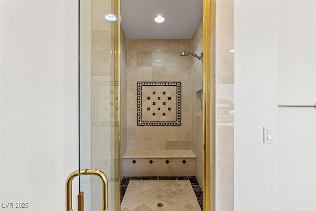 2846 Barrow Downs St, Las Vegas, NV 89135 - full bathroom featuring a shower stall, inlaid floor details, and tile patterned floors