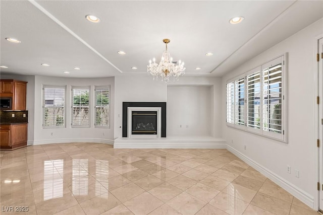 2846 Barrow Downs St, Las Vegas, NV 89135 - unfurnished living room featuring light tile patterned floors, a chandelier, recessed lighting, baseboards, and a glass covered fireplace