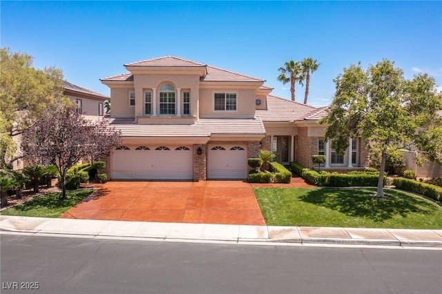 2846 Barrow Downs St, Las Vegas, NV 89135 - mediterranean / spanish-style house with an attached garage, a tile roof, a front yard, driveway, and stucco siding