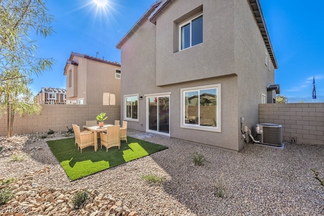 803 Calm Crystal Ct Lot 143, North Las Vegas, NV 89081 - back of property with central air condition unit, a fenced backyard, stucco siding, and a patio area
