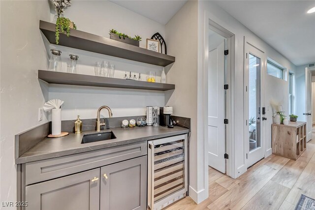 365 Crown Mesa Ave, Las Vegas, NV 89138 - indoor wet bar featuring beverage cooler and light wood-style floors