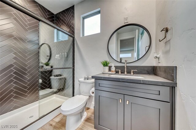 365 Crown Mesa Ave, Las Vegas, NV 89138 - bathroom featuring vanity, toilet, and a stall shower