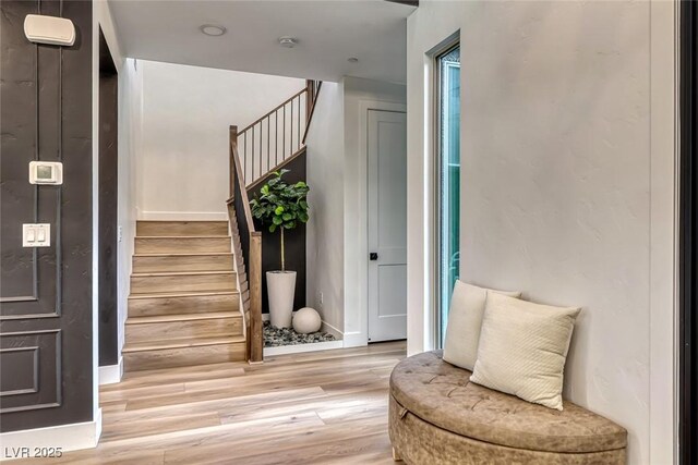365 Crown Mesa Ave, Las Vegas, NV 89138 - living area with wood finished floors, stairway, and baseboards