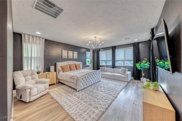 365 Crown Mesa Ave, Las Vegas, NV 89138 - bedroom featuring light wood-style floors, a chandelier, and recessed lighting