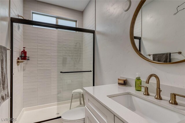 365 Crown Mesa Ave, Las Vegas, NV 89138 - full bathroom with a shower stall, vanity, and toilet