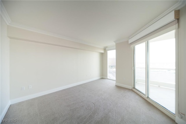 2777 Paradise Rd Unit 1505, Las Vegas, NV 89109 - empty room featuring carpet floors, crown molding, and baseboards