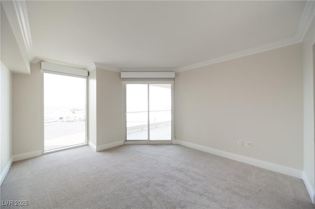 2777 Paradise Rd Unit 1505, Las Vegas, NV 89109 - spare room with ornamental molding, carpet flooring, and baseboards