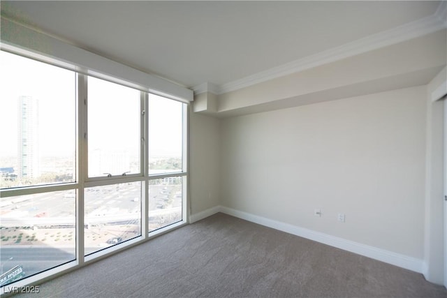 2777 Paradise Rd Unit 1505, Las Vegas, NV 89109 - carpeted empty room with ornamental molding and baseboards