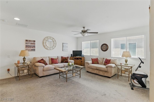6322 Angora Peak Ln, Las Vegas, NV 89115 - carpeted living area featuring ceiling fan