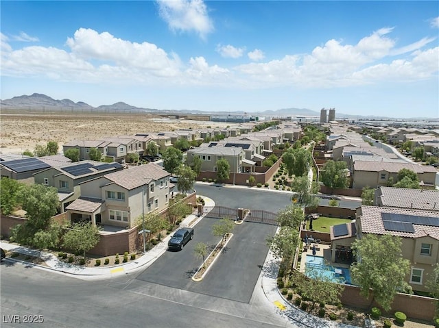 6322 Angora Peak Ln, Las Vegas, NV 89115 - aerial view of residential area featuring a mountainous background