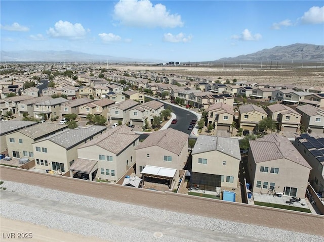 6322 Angora Peak Ln, Las Vegas, NV 89115 - aerial perspective of suburban area featuring a mountainous background