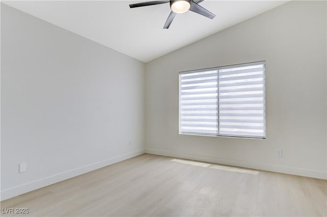 7865 March Brown Ave, Las Vegas, NV 89149 - spare room featuring lofted ceiling, light wood-type flooring, a ceiling fan, and baseboards