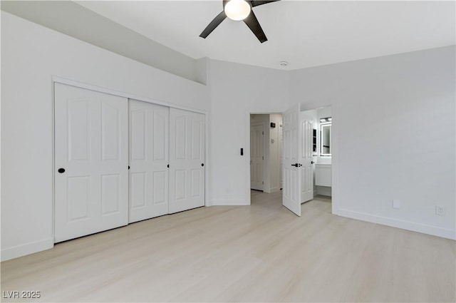 7865 March Brown Ave, Las Vegas, NV 89149 - unfurnished bedroom featuring light wood-style flooring, baseboards, a closet, and ceiling fan