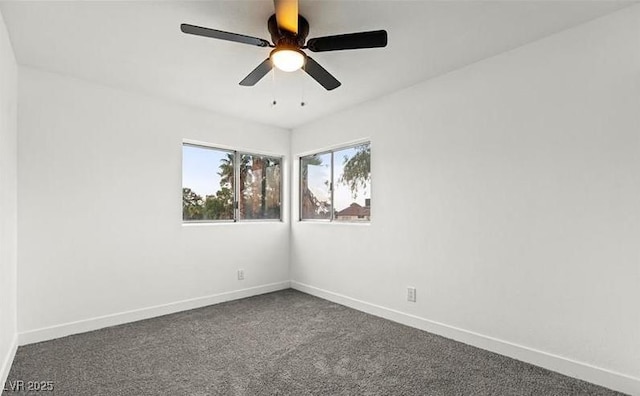 4046 Bridgeview Cir, Las Vegas, NV 89147 - spare room with baseboards, ceiling fan, and dark colored carpet